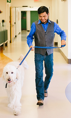 carretero-samuel-and-dog-hallway-228x378