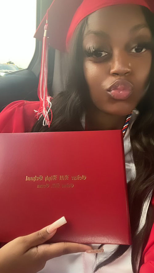 Nina-with-her-dipoma-2-500x889